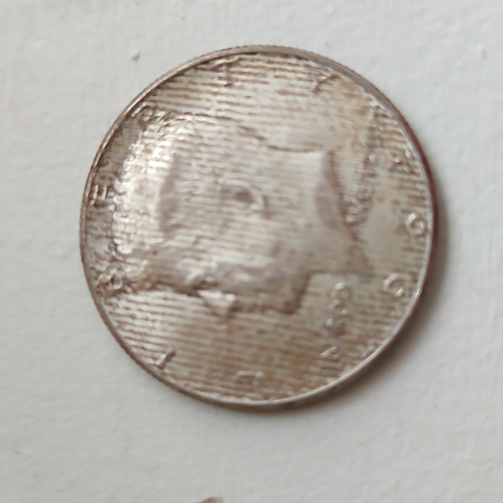 1964 Accent Hair Liberty Kennedy Half Dollar Cameo Coin from the United States